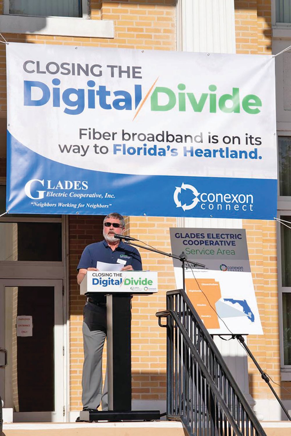 Glades Electric CEO Jeff Brewington delivers the broadband partnership announcement from the steps of the Glades County Courthouse where the first co-op members formed GEC 77 years ago.